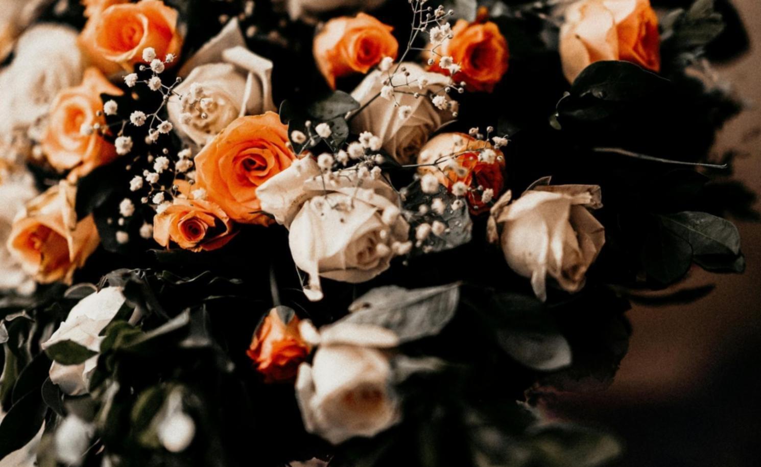 Workshop participants arranging flowers during hands-on session